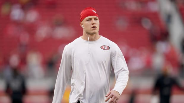 Dec 25, 2023; Santa Clara, California, USA; San Francisco 49ers running back Christian McCaffrey (23) walks on the field before the start of the game against the Baltimore Ravens at Levi's Stadium. Mandatory Credit: Cary Edmondson-USA TODAY Sports